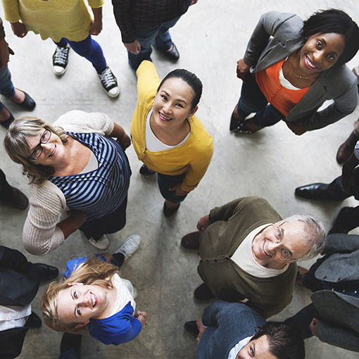 Disability Insurance Overhead view of various types of people looking up